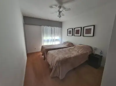 a bedroom with two beds and a ceiling fan at VILAMOURA APARTMENT NEAR MARINA AND BEACHES in Quarteira