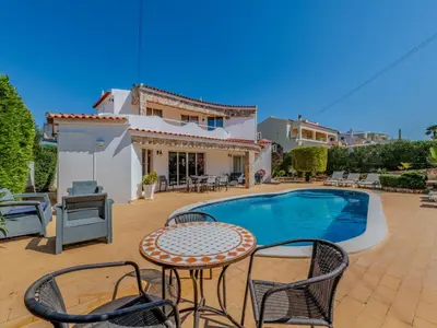a courtyard of a house with a garden at Holiday Home Paulo - VIP Properties by Interhome in Galé
