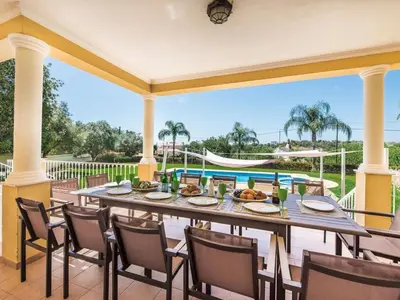 a villa with a driveway and a fence at Villa Monte Sol - VIP Properties by Interhome in Azinhal