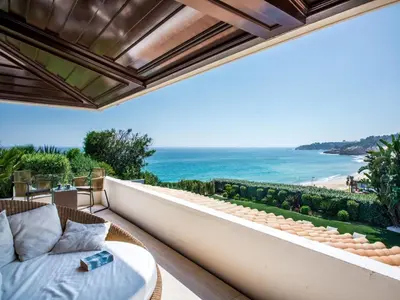 a view of the ocean from the balcony of a house at Outstanding Algarve Villa 8 Bedrooms Villa Agua Grande Deluxe Seaviews in Albufeira