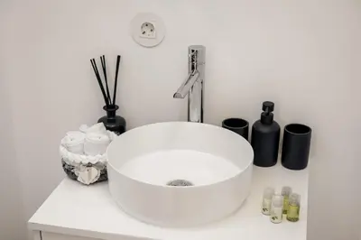 a white sink sitting on top of a counter at Casa Passion in Faro