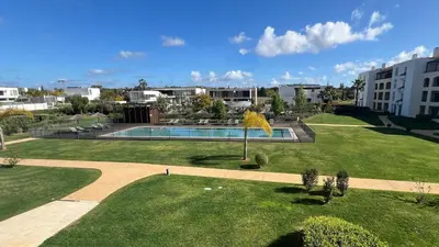 an image of a park with a swimming pool at Apartamento T2 novo e espaçoso em Vilamoura in Vilamoura