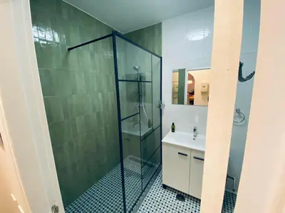 a bathroom with a shower and a sink at Albufeira INN - Lote 6 T1 in Albufeira