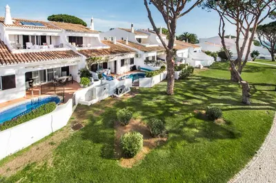 an aerial view of a house with a yard at Mng Elliott72 in Vale do Lobo