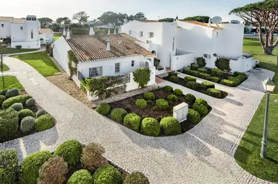 a view of the green on the golf course at Mng Elliott42 in Vale do Lobo