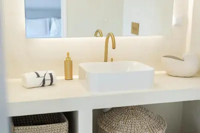 a bathroom with a sink and a mirror at Modern retreat 3 Bedroom in Vilamoura in Quarteira