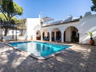 a swimming pool in the backyard of a house at Akisol Faro Relax in Faro
