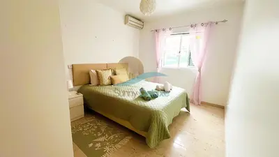 a small bedroom with a bed and a window at Villa GP by Sunny Deluxe in Albufeira