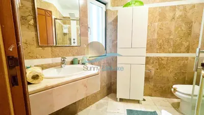 a bathroom with a sink and a toilet at Villa GP by Sunny Deluxe in Albufeira