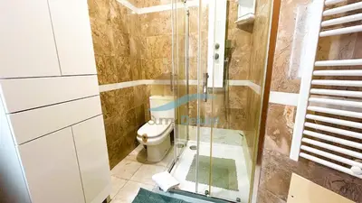 a bathroom with a shower and a toilet at Villa GP by Sunny Deluxe in Albufeira