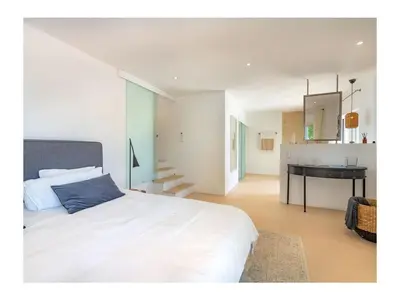 a bedroom with a bed and a desk in a room at Casa Monte Algarve Comfortable holiday residence in Loulé
