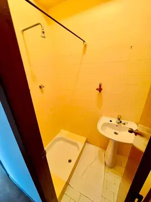 a bathroom with a sink and a bath tub at Apartamento Faro - T3 in Faro