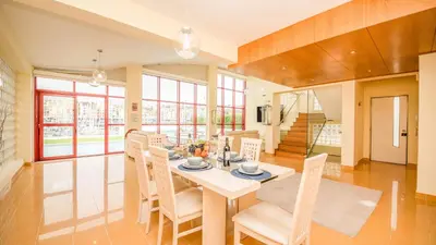 a dining room with a table and chairs at Villa Dolce Vita by Algarve Vacation in Albufeira
