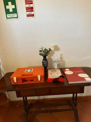 a stairway with a chair next to a window at Casa Amarela in Faro