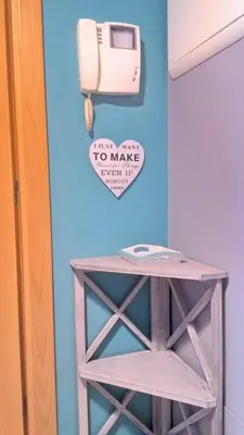 a wall with a paper towel dispenser on a wall at Lovely 2 Bedroom S Jose Apartment in Albufeira