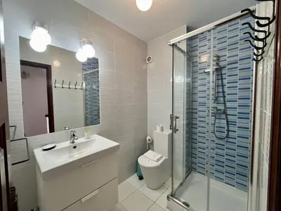 a bathroom with a toilet and a sink and a shower at Old Village, 2 bedrooms, 5 ppl, Beach, Golf, Padel in Vilamoura