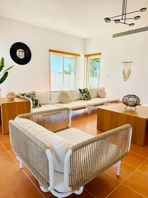 a bedroom with a bed and a mirror at Vila Taliéna in Albufeira