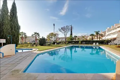 a street view of a building at Marina Family Duplex with Pool in Quarteira