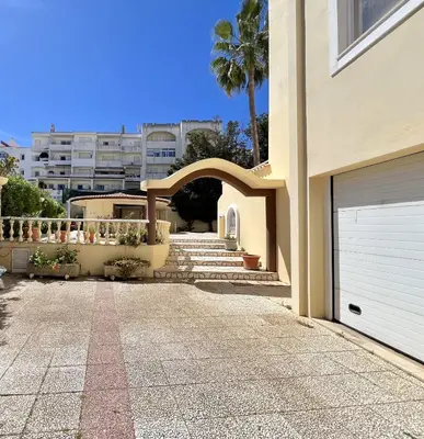 a driveway of a house with a garage at Albufeira Marina Sol With Pool by Homing in Albufeira