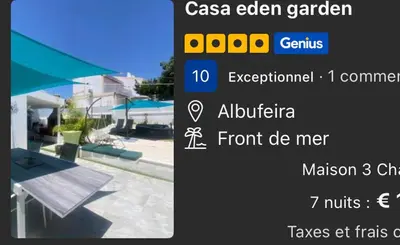 a screenshot of a website with a picture of a patio at Casa eden garden in Albufeira