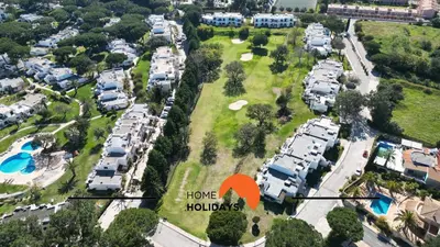 an aerial view of a park with a home holidays sign at #214 Vivenda 3 Quartos by Home Holidays in Albufeira