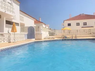 a large swimming pool in front of a building at RoofTOP Everest : vue mer panoramique amazing in Albufeira