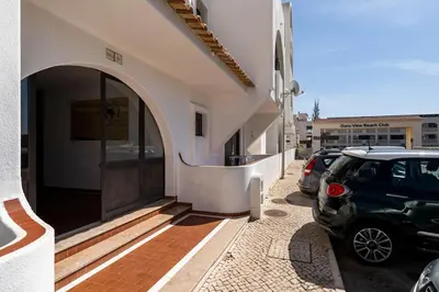 a car parked next to a building with a door at RoofTOP Everest : vue mer panoramique amazing in Albufeira
