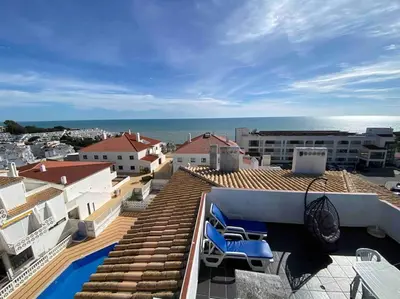 a view of the ocean from the roof of a building at RoofTOP Everest : vue mer panoramique amazing in Albufeira