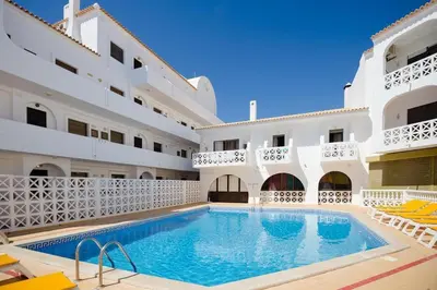 a swimming pool in the courtyard of a building at RoofTOP Everest : vue mer panoramique amazing in Albufeira
