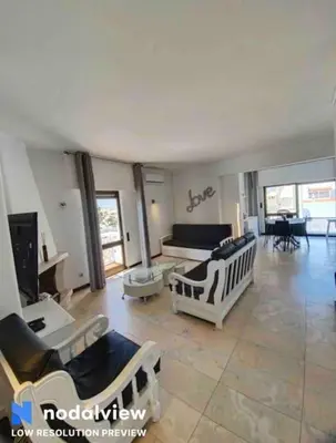 a large living room with couches and a couch at Double ROOFTop Mont-Blanc : vue plage amazing in Albufeira