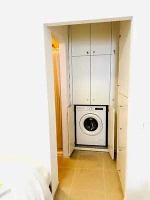 a bathroom with a white sink and a mirror at Sea View, Beach 3 minutes in Albufeira