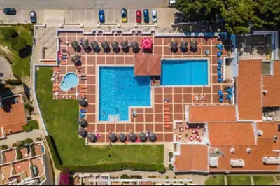 an overhead view of a building with a swimming pool at ELdorado JArdim open view beach 5 minutes foot in Albufeira