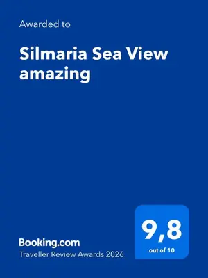 a screenshot of a cell phone with the text upgraded to clinica sea view amazing at Silmaria Sea View amazing in Albufeira