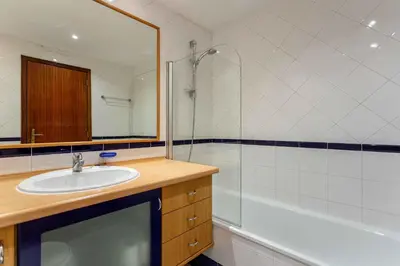 a bathroom with a sink and a shower at Blife Amorya private apartment in Faro