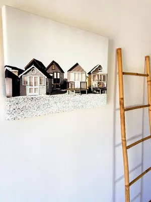 a painting of a row of houses on a wall at Villa Sarah by BeCherish in Quarteira
