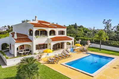an aerial view of a house with a swimming pool at Villa Vista Mar by Villa Plus in Terras Novas
