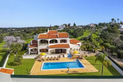 an aerial view of a house with a swimming pool at Villa Vista Mar by Villa Plus in Terras Novas