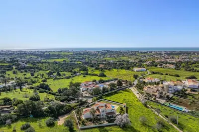 an aerial view of a house in a suburb at Villa Vista Mar by Villa Plus in Terras Novas
