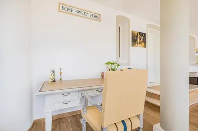 a home office with a desk and a chair at Villa Los Angeles by Algarve Vacation in Boliqueime
