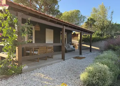 a house with a porch with a patio at Casa Ana Almancil in Almancil