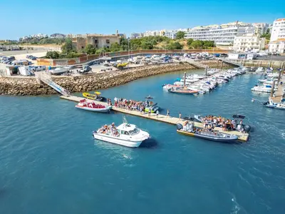 a group of boats are docked in a harbor at Villa Ibiza by Algarve Vacation in Guia