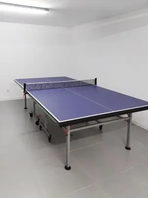 a ping pong table with a purple top on it at AL - Villas Country Club in Vilamoura