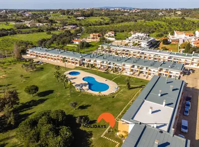 an aerial view of a resort with a swimming pool at #226 Vila LII by Home Holidays in Albufeira
