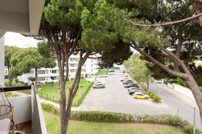 a view of a street with cars parked in a parking lot at Dona Marieta House in Vilamoura