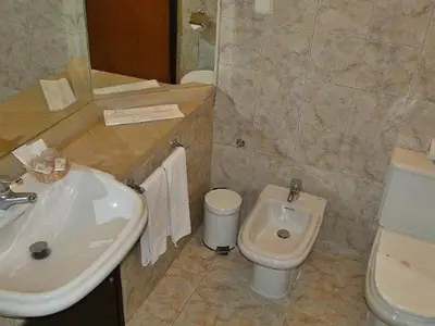 a bathroom with a sink and a toilet at Perfect Albufeira 1 Bedroom apartment in Albufeira