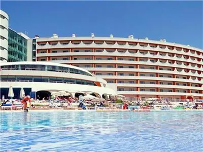 a hotel with a swimming pool in front of a building at Perfect Albufeira 1 Bedroom apartment in Albufeira