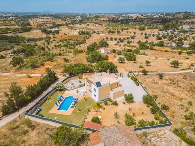 an aerial view of a house with a swimming pool at Villa Maya Bay by Algarve Vacation in Guia