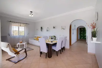 a kitchen with a bowl of fruit on a counter at J R Dream house in Quarteira