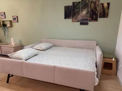a bed with two pillows on it in a room at Balaia Golf Village apt 105 in Albufeira