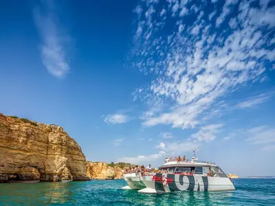 a group of people on a boat in the water at Luxury 1 Bedroom Apartment, Marina de Albufeira in Albufeira